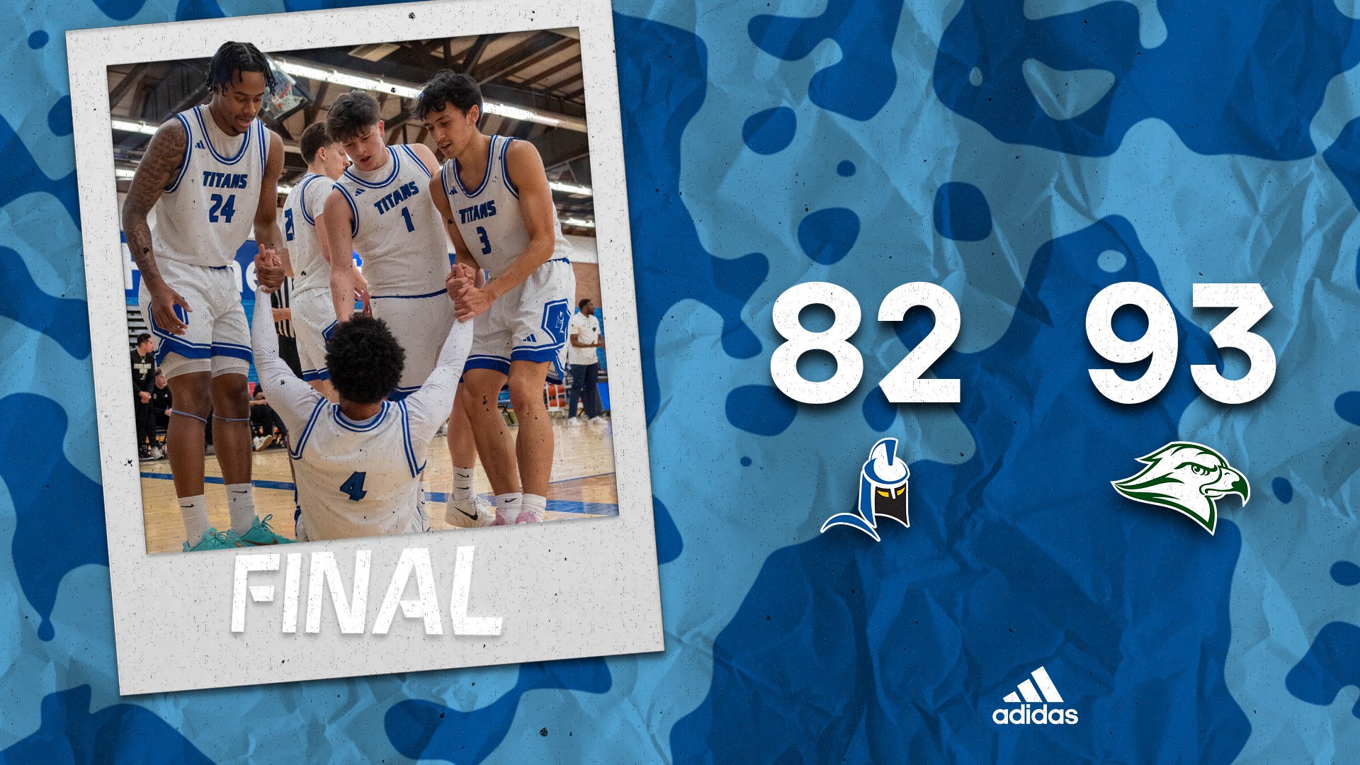 Final score with a group of players helping up their teammate.